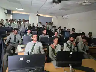 Students learning in a computer lab