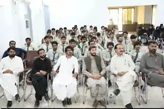 Students and guests seated during an academic programme